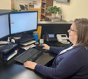 Our office team member working to schedule appointments
