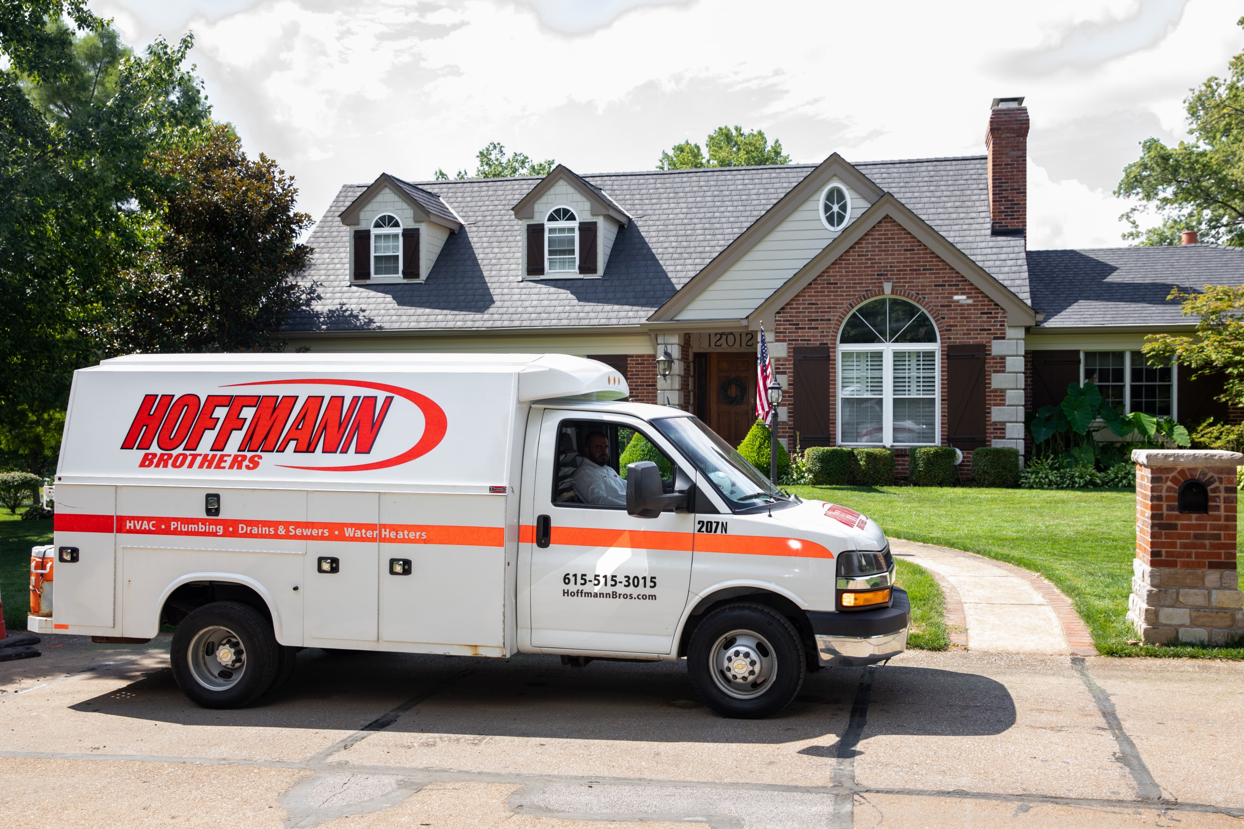 Hoffmann Brothers truck parked outside of a Nashville residence prior to an efficient and timely toilet installation