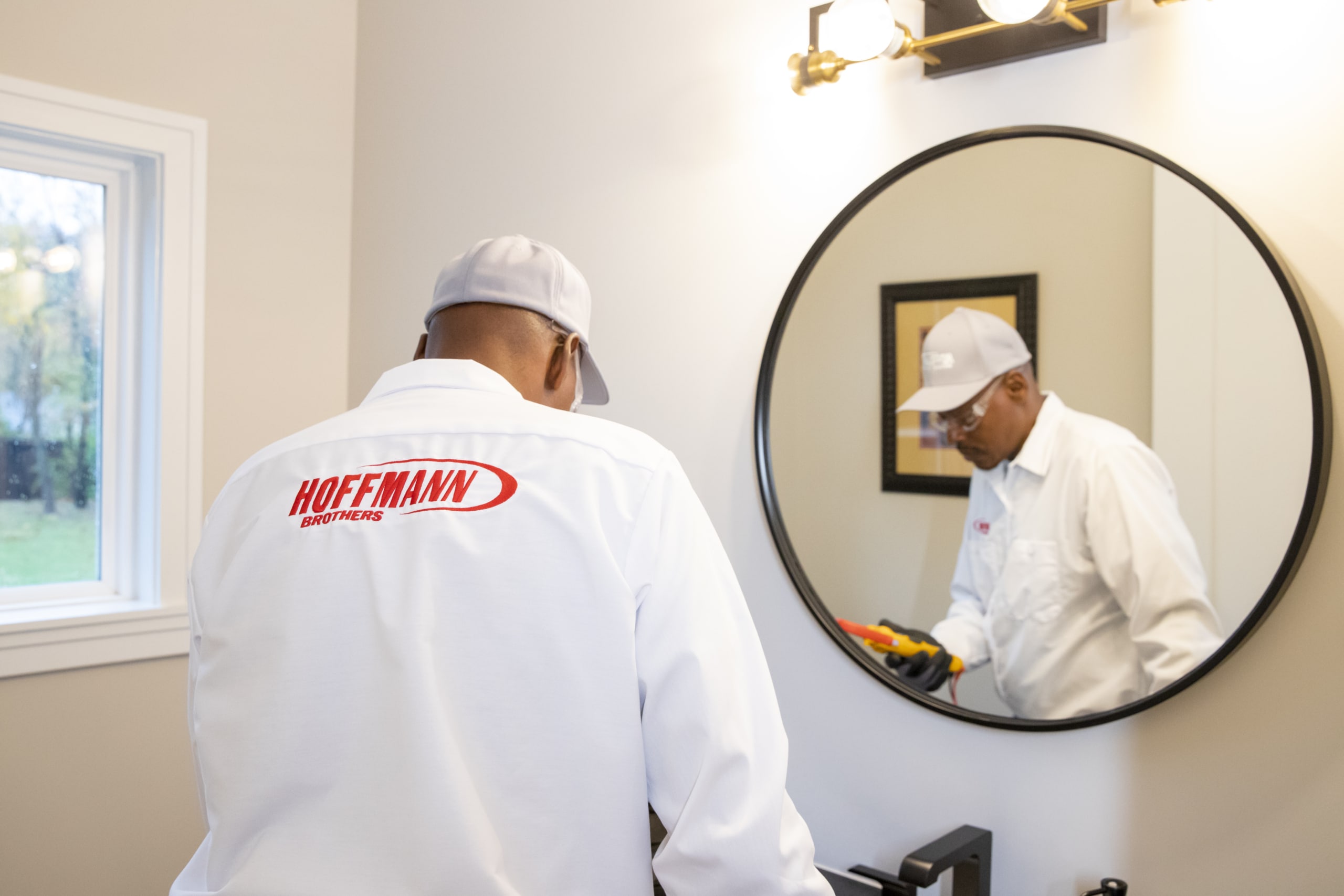 hoffmann electrician replacing electrical wiring in St Louis bathroom