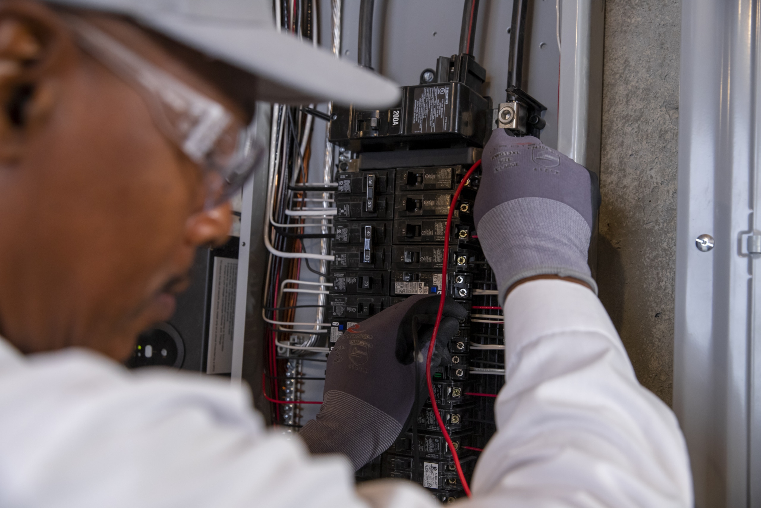 Close-up of a residential circuit breaker panel during service