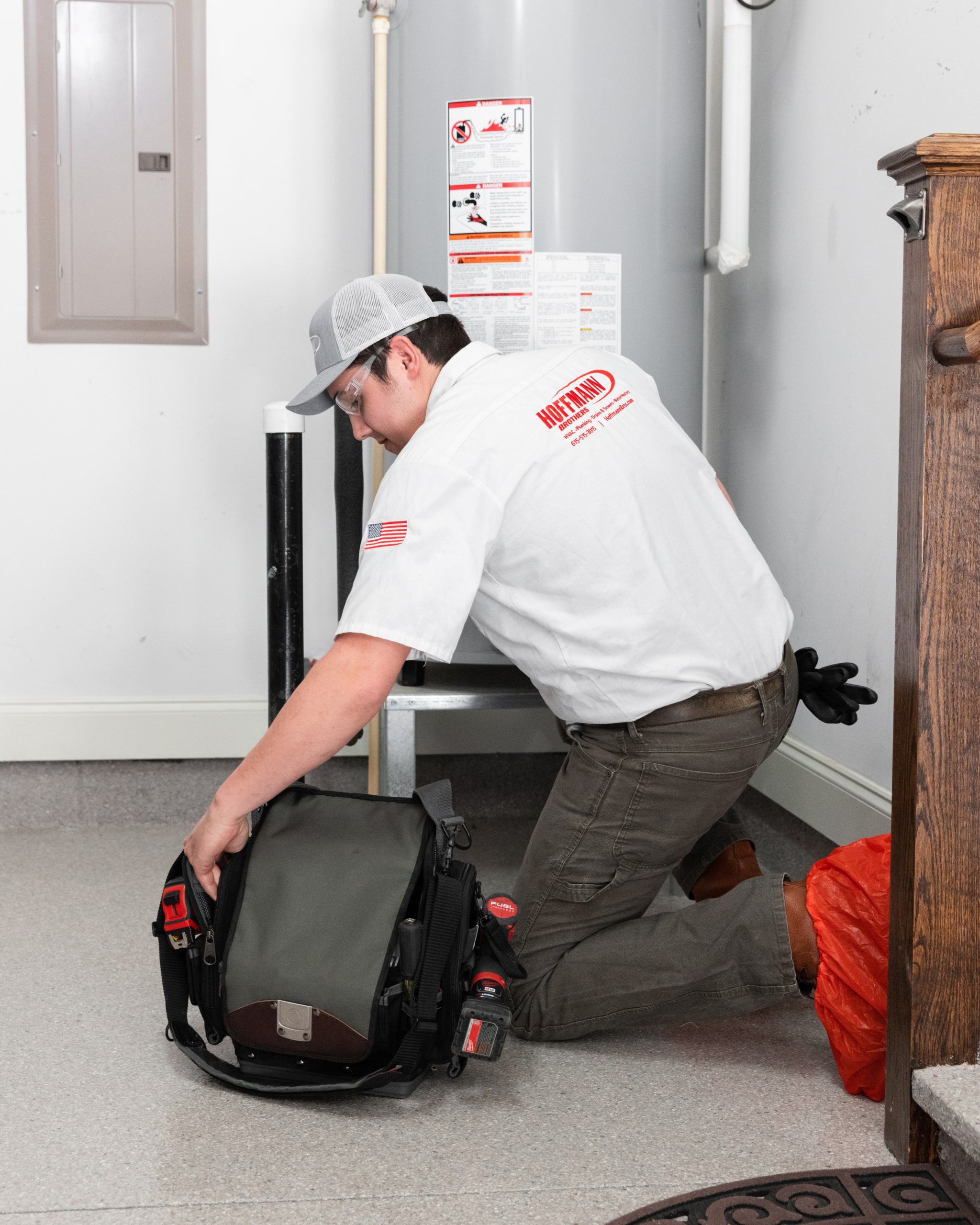 Technician Arriving With Equipment for Emergency Hot Water Heater Repair