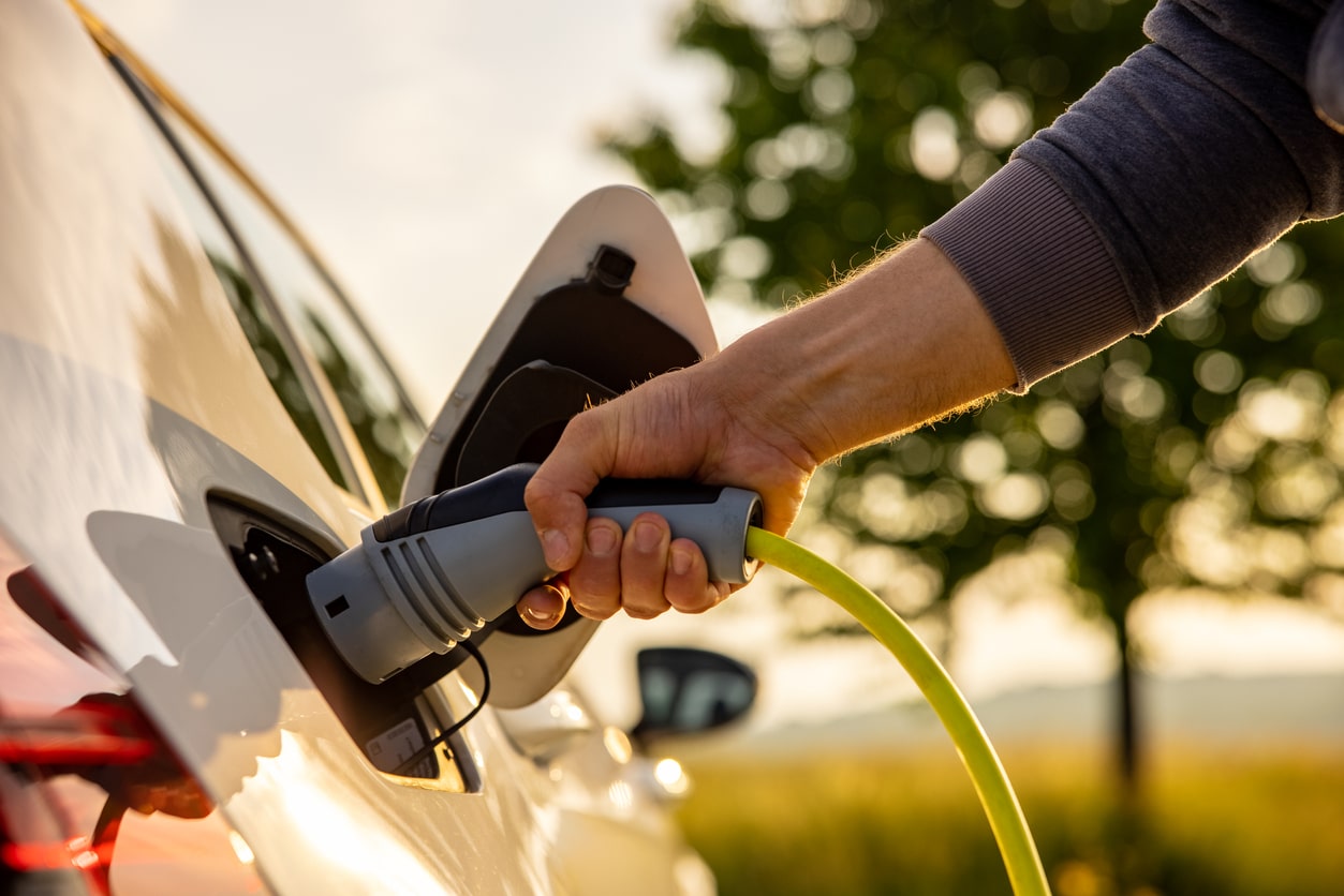 A Home EV Charger Charging An Electric Car