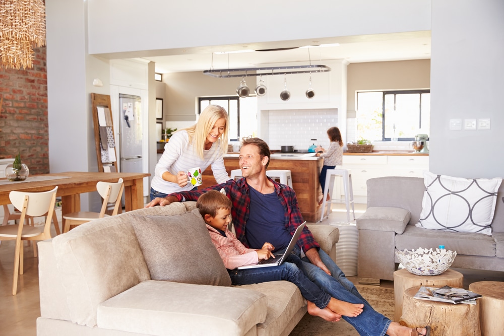 Family enjoying their home after getting air conditioning maintenance