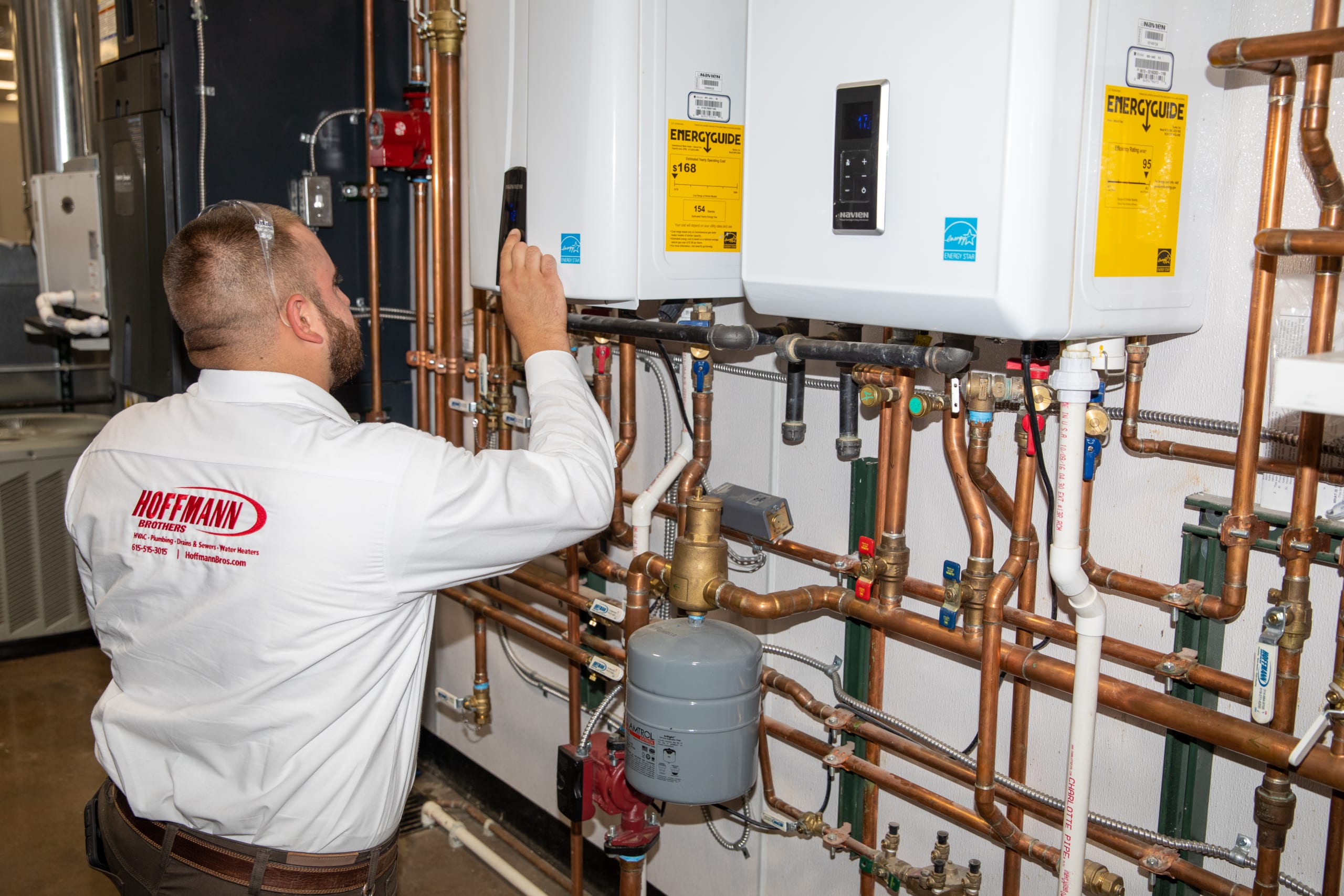 Technician Performing Emergency Water Heater Repair